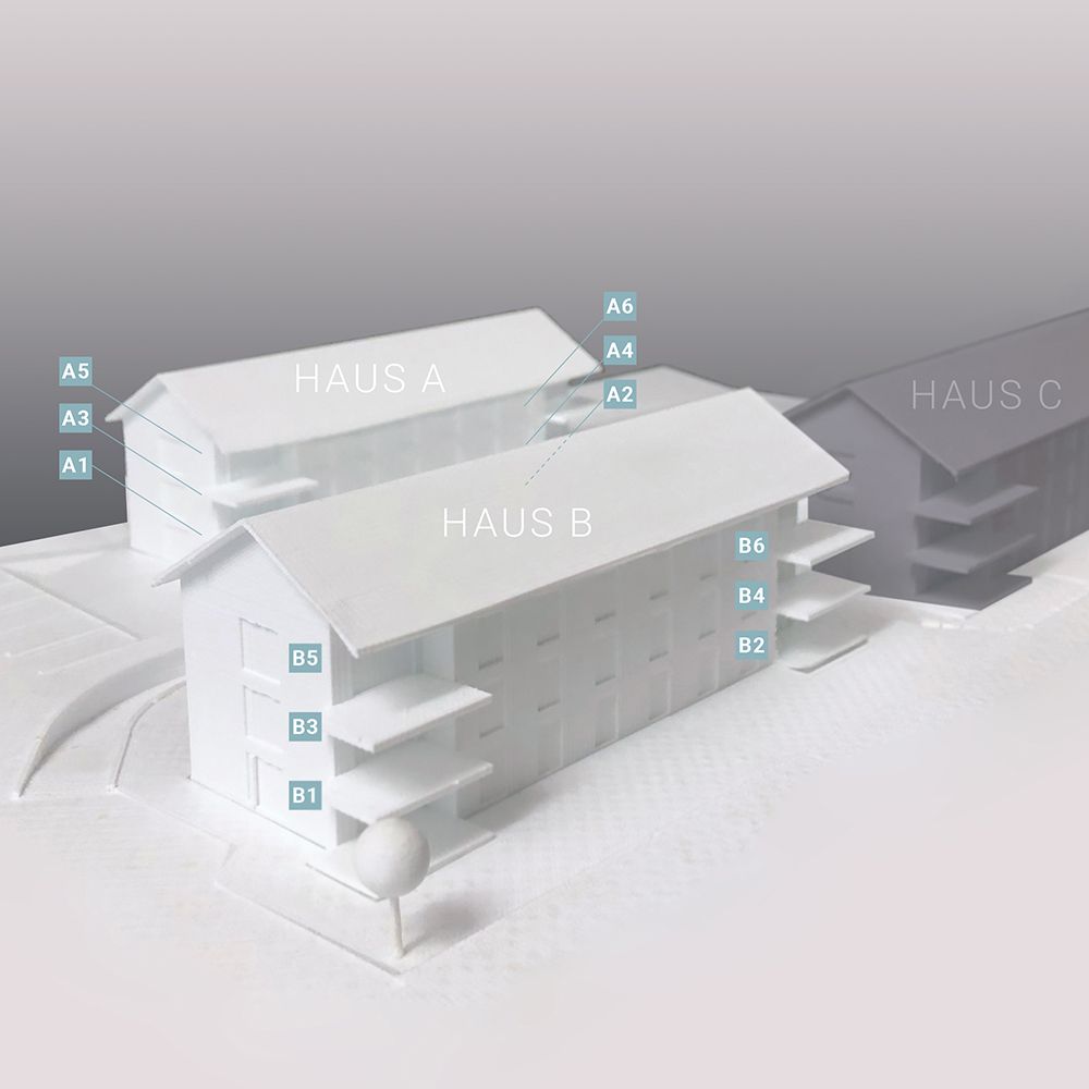 Modell der Überbauung mit Bezeichnung der einzelnen Wohnungen